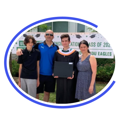 Francesco Coniglione with his family at his high school graduation in June 2021.